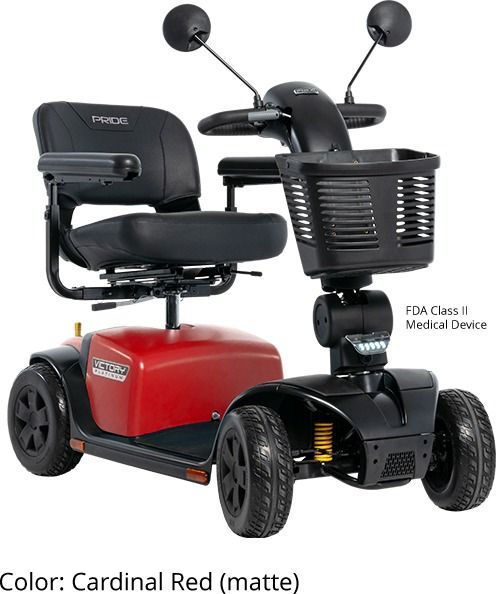 Mobility scooters and recliners displayed in a furniture showroom