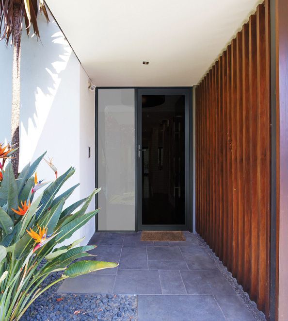 Security doors installation ensuring a perfect fit, durability, and enhanced home protection IntrudaGuard Security Doors installed on a front entry providing strong mesh protection and ventilation