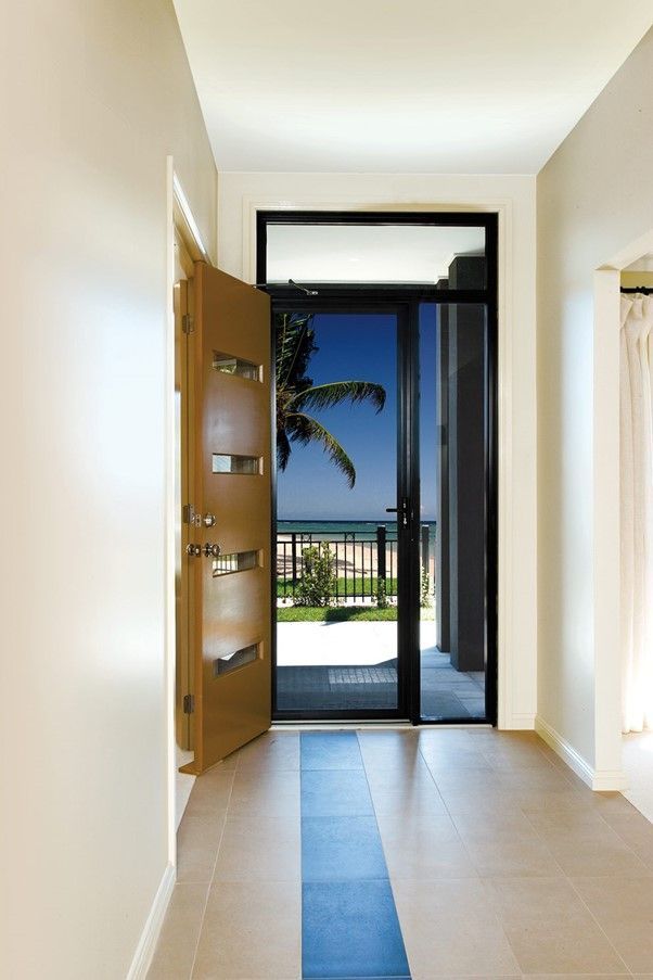 Modern home entry with durable security doors offering airflow, visibility, and strong protection