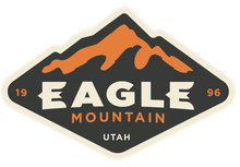 Eagle mountain utah logo with a mountain in the background