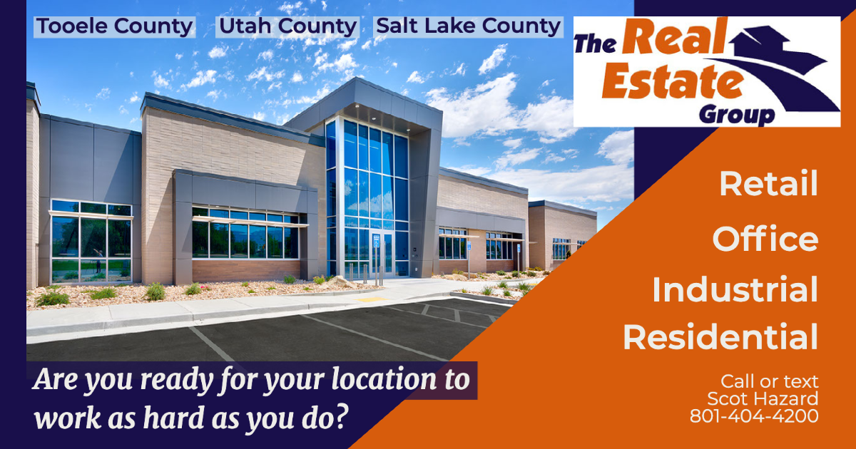 An advertisement for the real estate group shows a large building