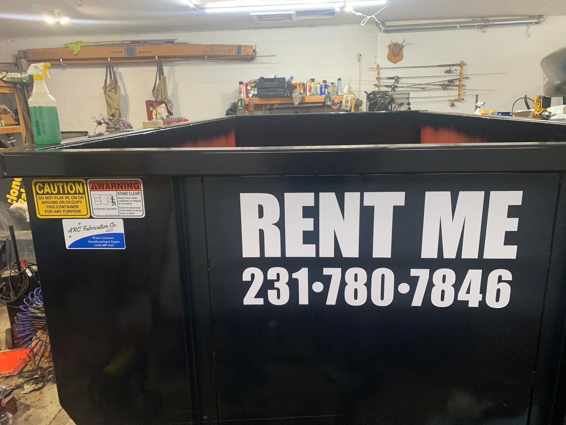 Black dumpster with 