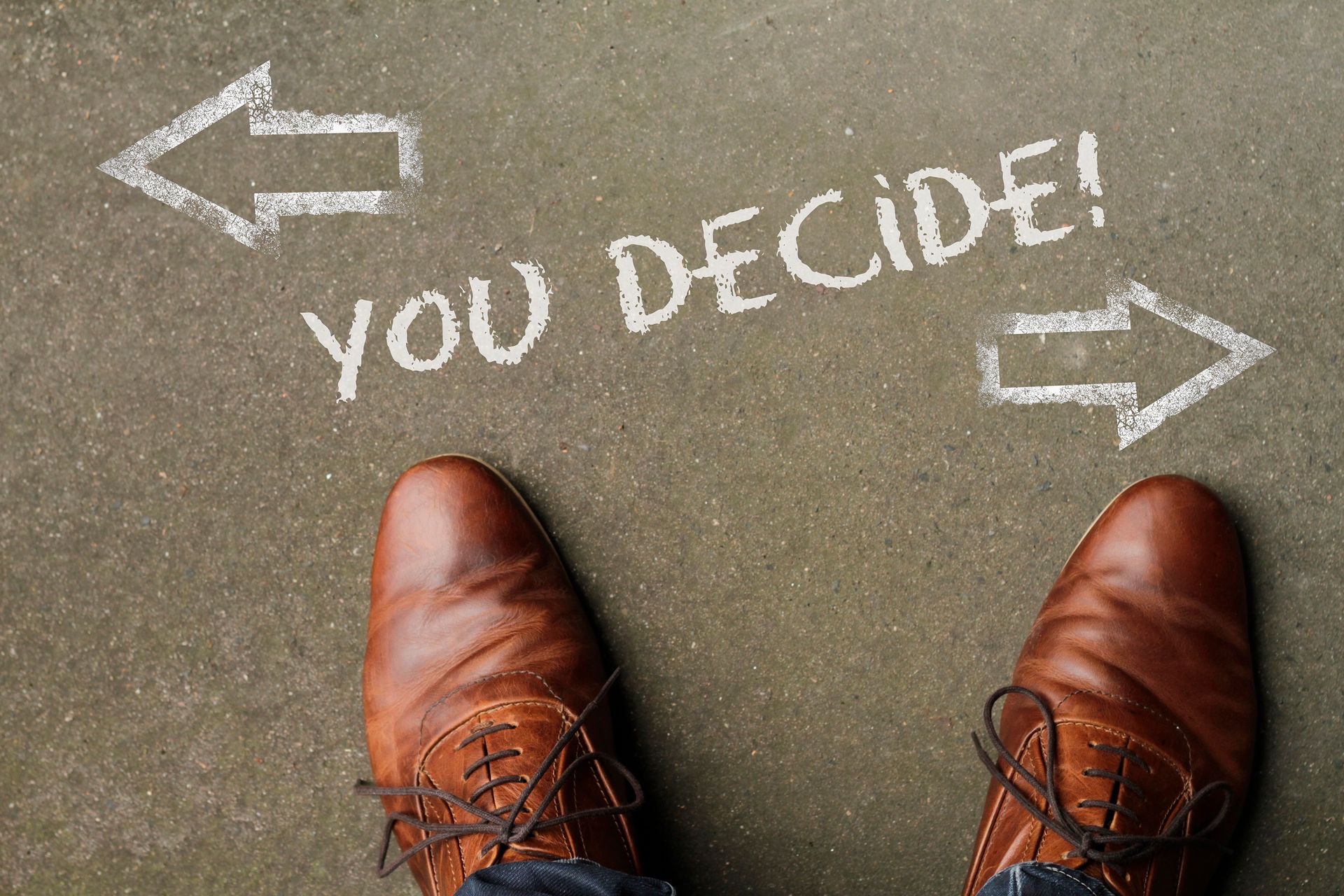 A person is standing in front of a sign that says `` you decide ''.