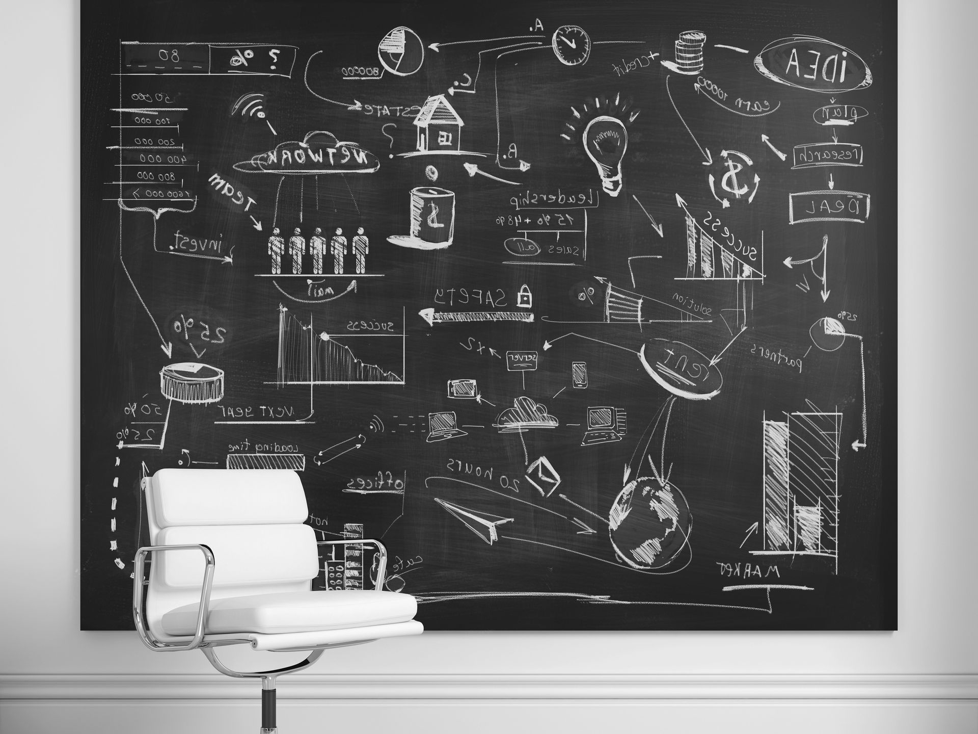 a chair is sitting in front of a large blackboard A chair is sitting in front of a large blackboard with drawings on it.