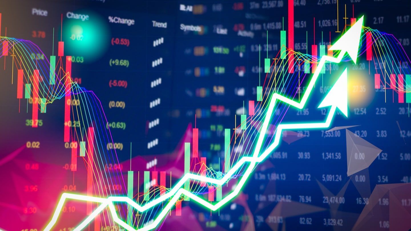 Glowing upward stock chart over trading data and candlestick graphs, showing rising market trend