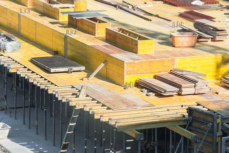 a construction site with a lot of steel beams