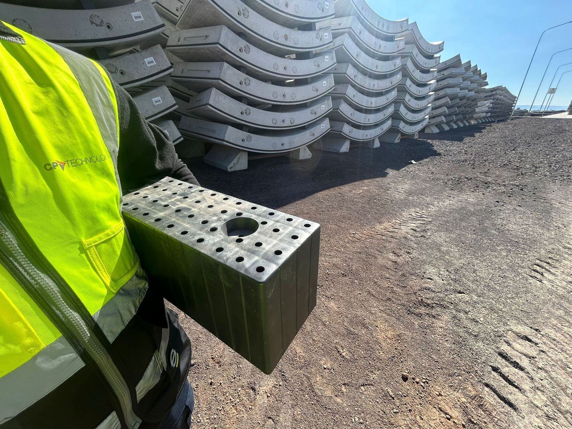 Operator handling a recycled plastic Green Spacer