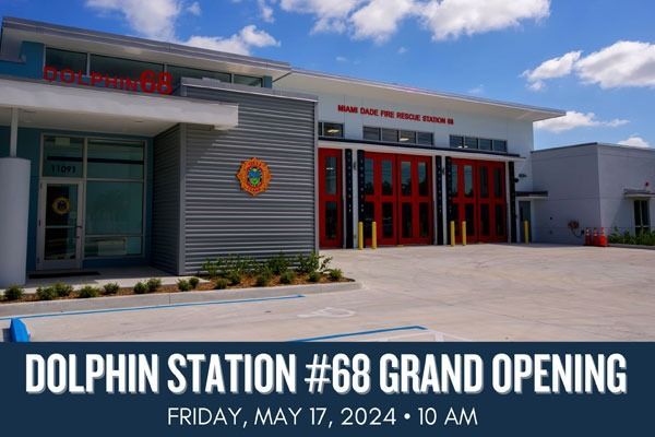 Dolphin Station #68 grand opening banner on a fire station exterior, Friday, May 17, 2024 at 10 AM