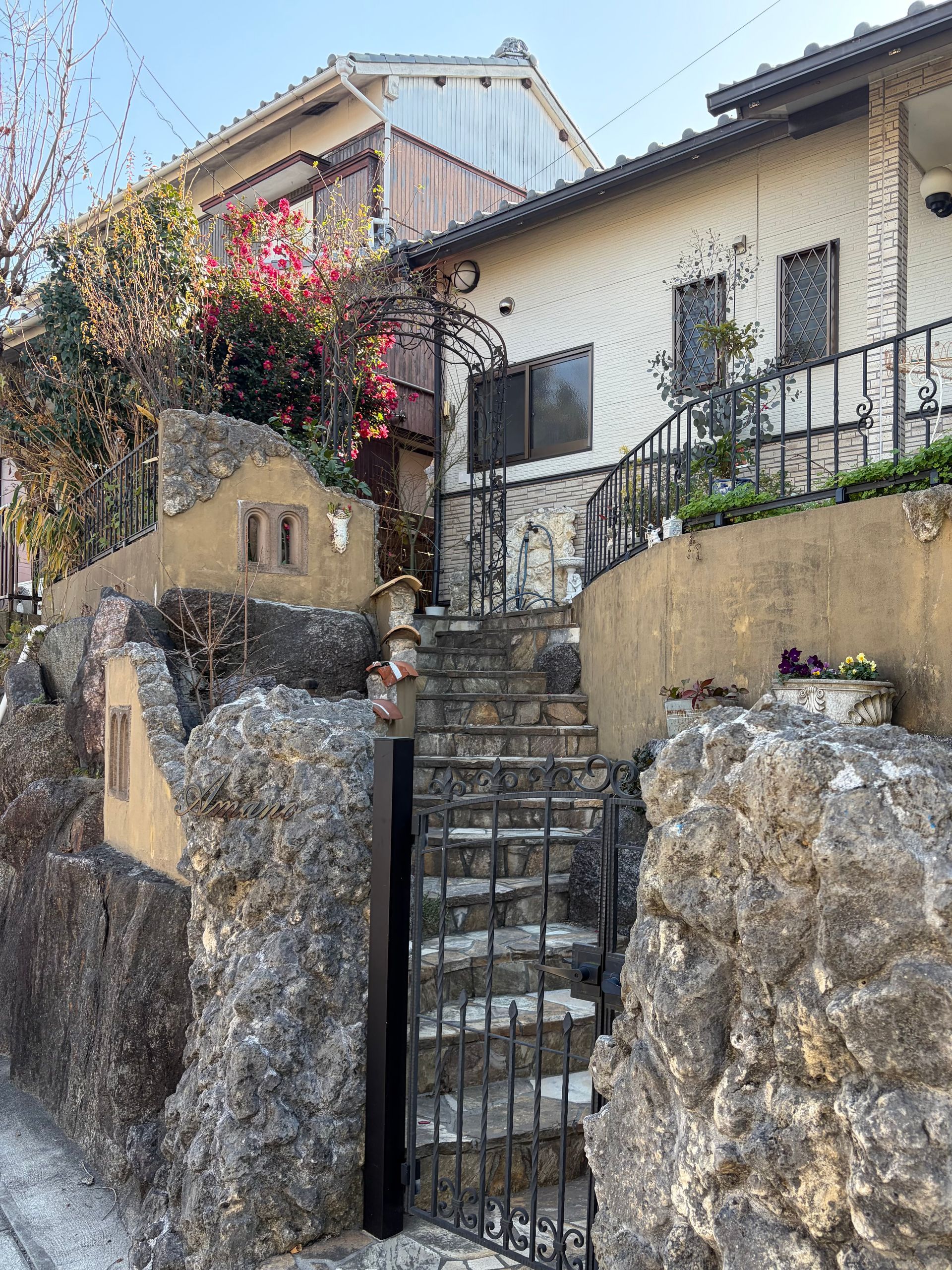 a Japanese older house that lookes a little like a house in a fairy tale