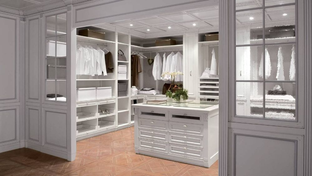 A Walk in Closet Filled with Lots of Clothes and A Table — Roll Edge In Manunda, QLD