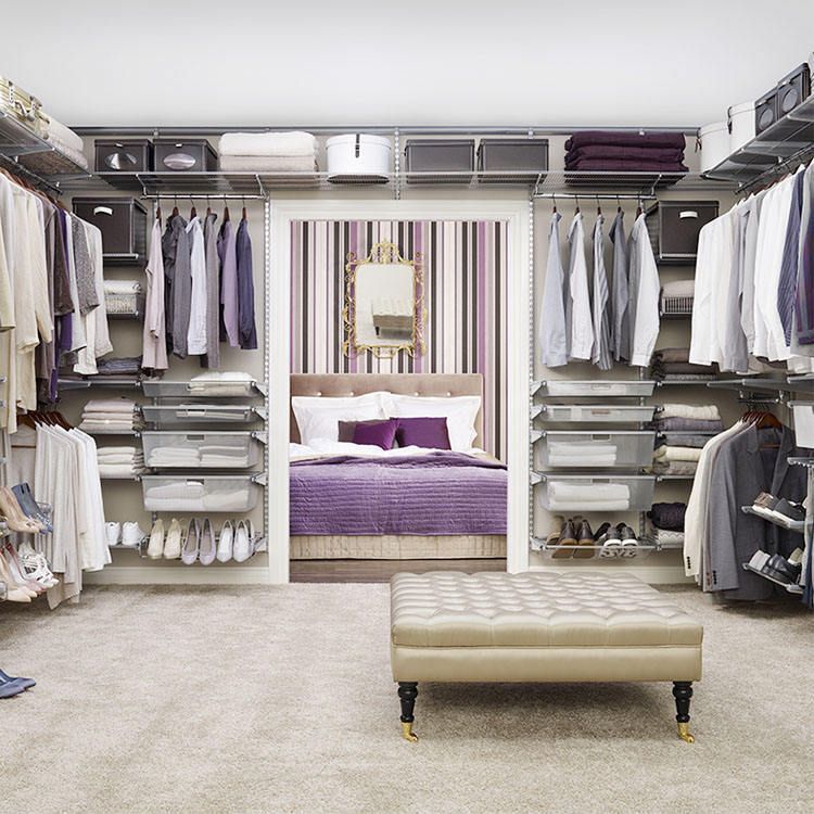 A Walk in Closet Filled with Clothes and Boxes — Roll Edge In Manunda, QLD