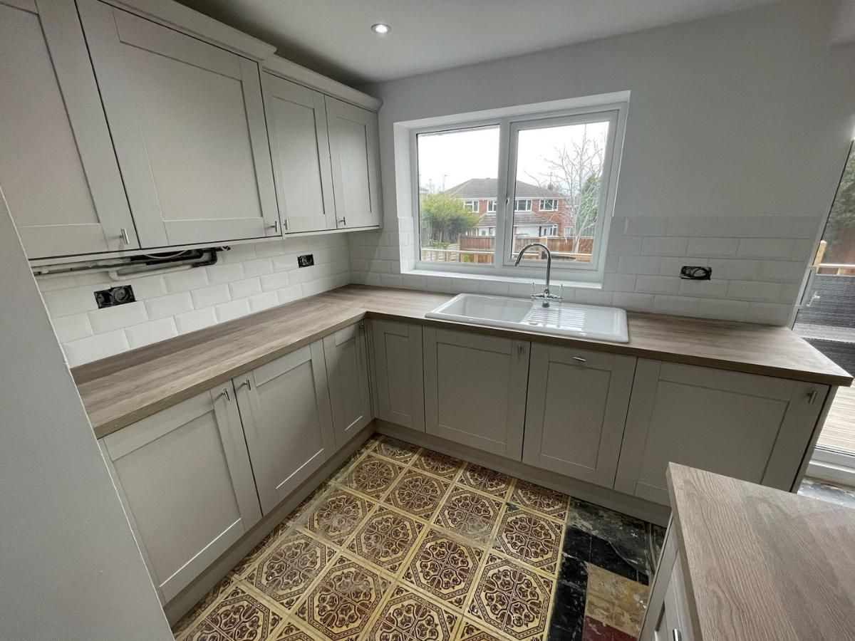 Derbyshire Joinery Specialists fitting a new kitchen Melbourne