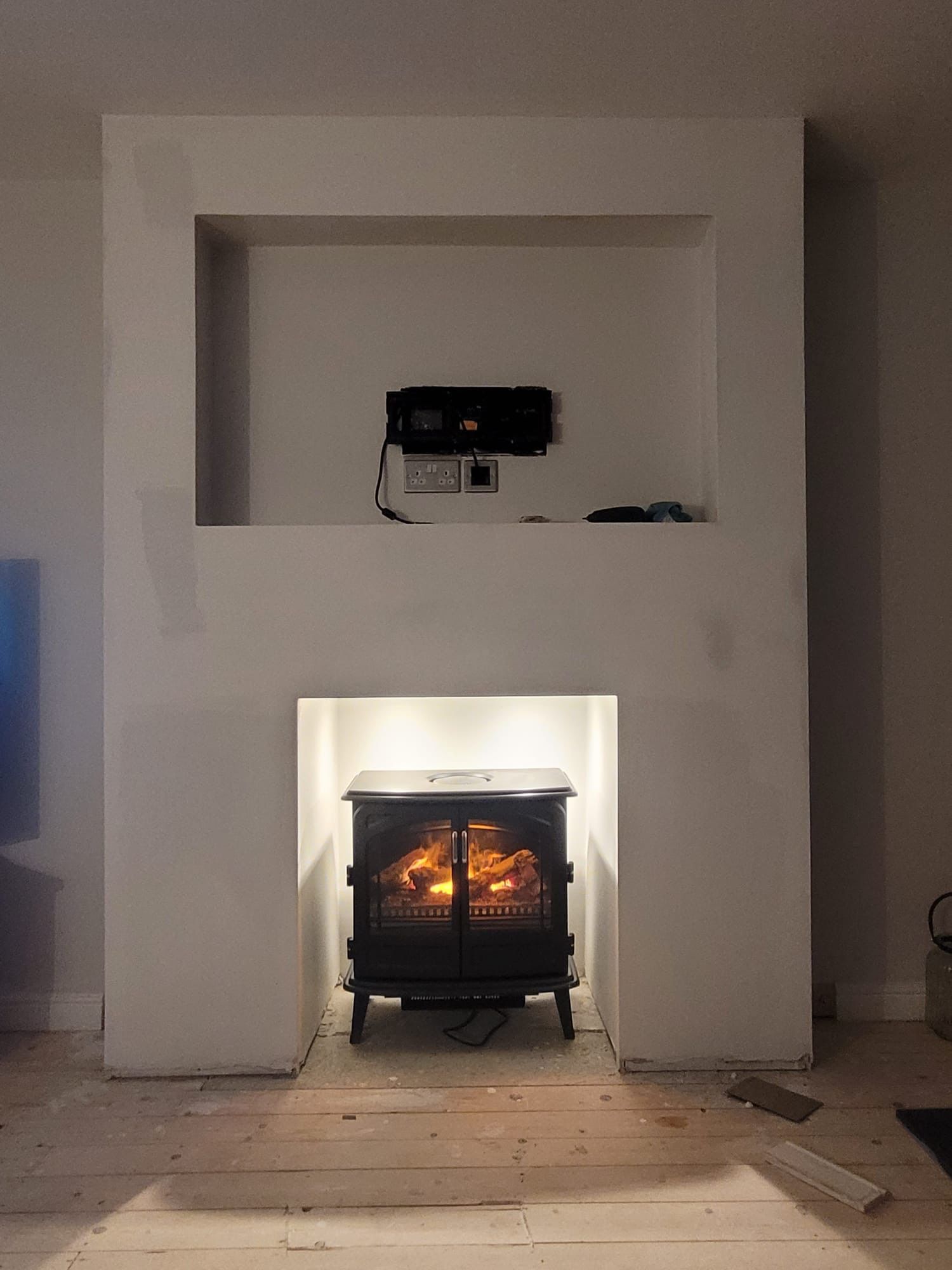 Derbyshire Joinery Specialists media stud wall for fireplace painted and electrics installed