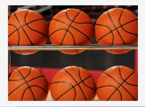 Rows of orange basketballs stacked on metal shelves in a gym equipment rack