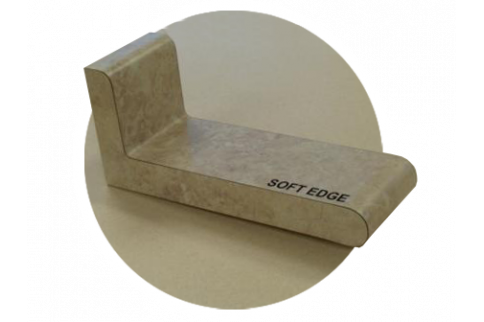 A piece of wood that says soft edge on it