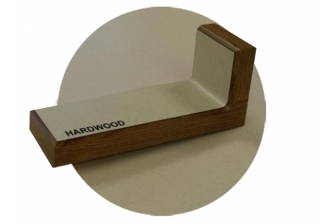 A piece of wood with the word hardwood on it