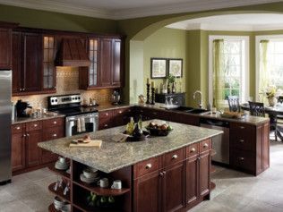 A kitchen with a large island in the middle of it