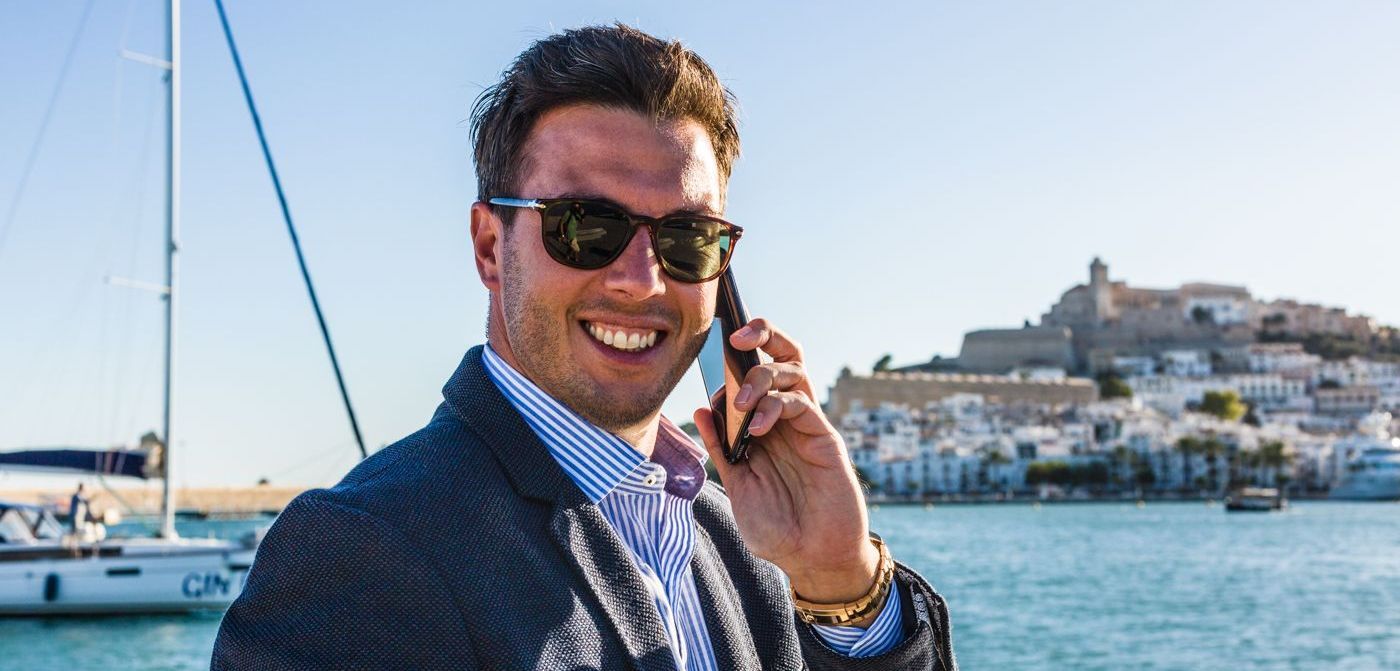 Samuel Cise drinking coffee on a yacht