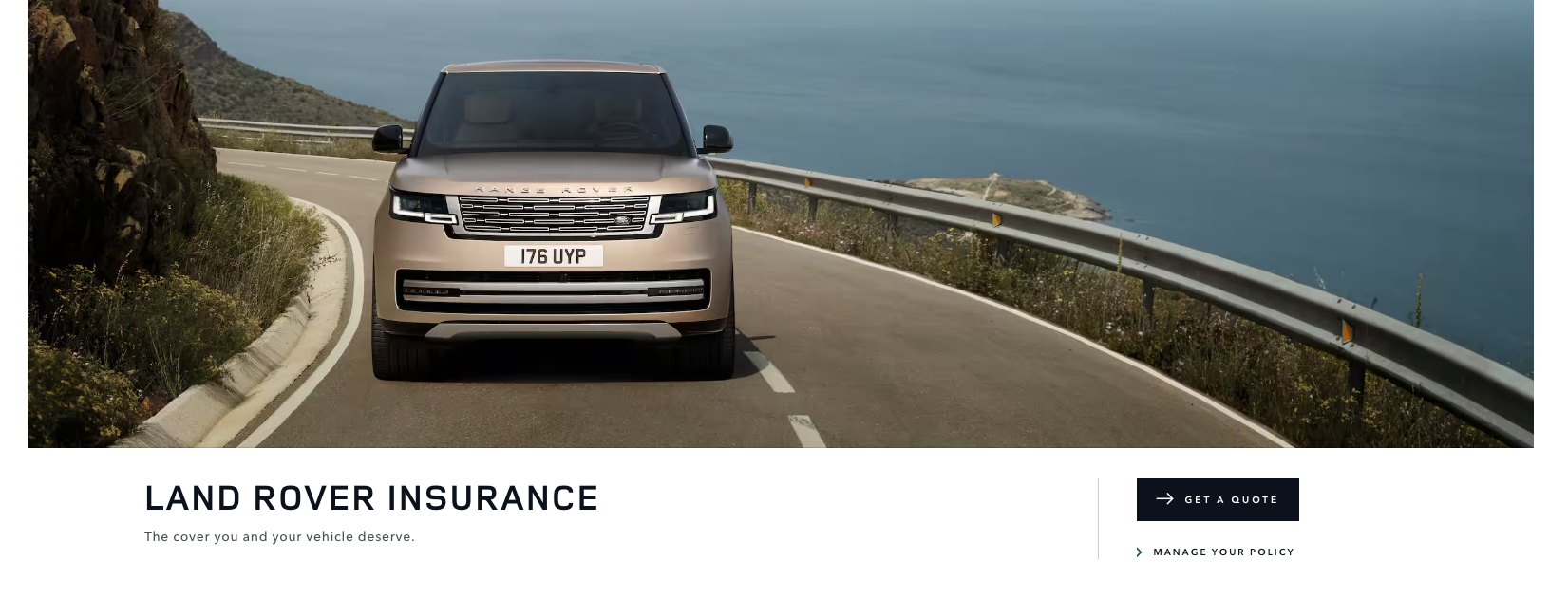 a land rover is driving down a curvy road .