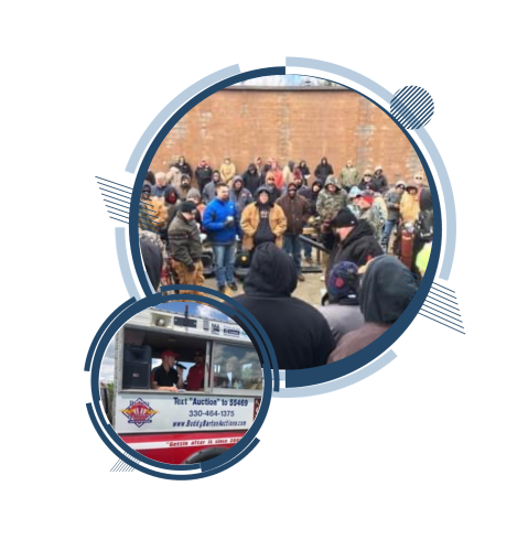 Group of people gathered outdoors, some listening to a speaker. A food truck is in the lower left.
