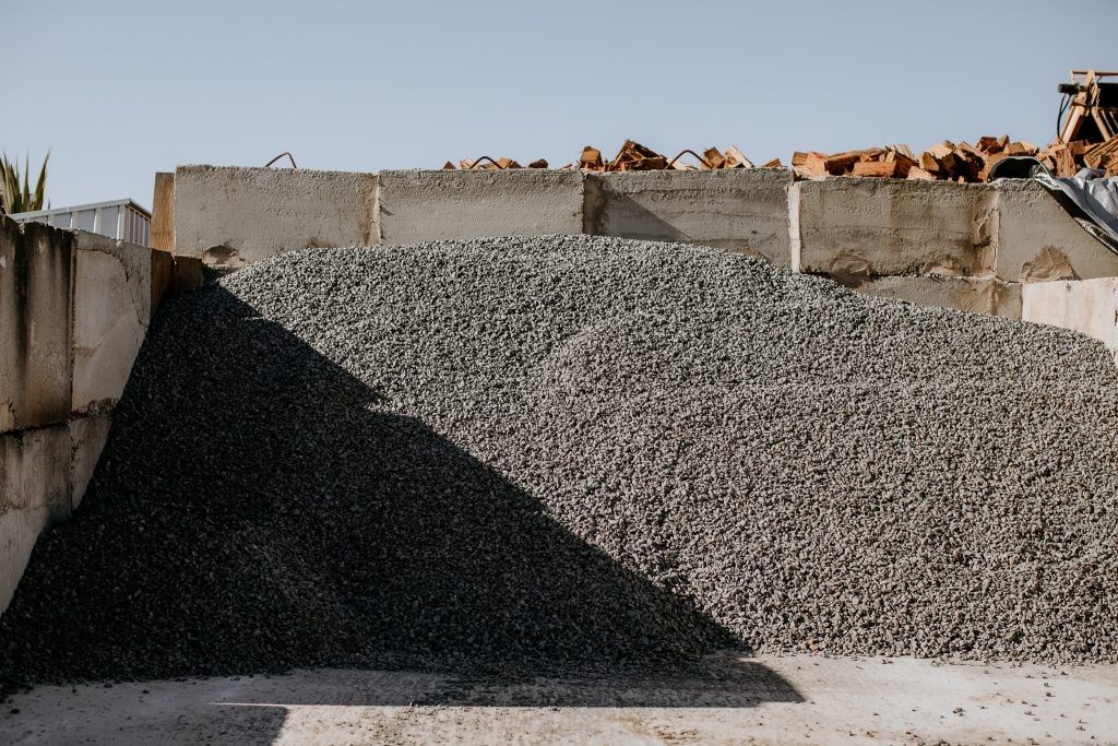 A Pile of Gravel is Sitting Next to a Pile of Concrete Blocks — Bonville Landscape Centre in Toorima, NSW