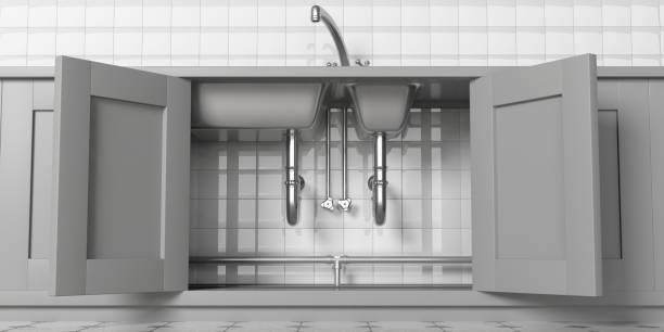 A kitchen sink with its doors open and two sinks underneath it.