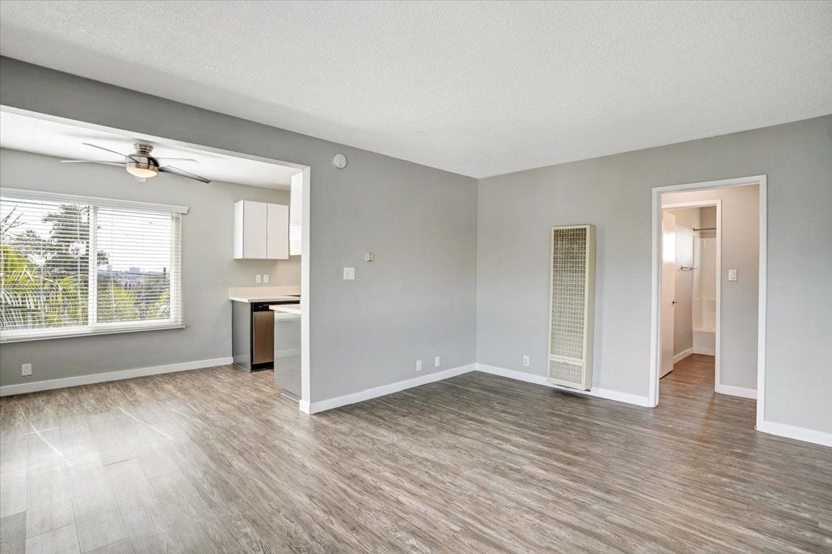 The Heights at Signal Hill Unfurnished living and dining room and door