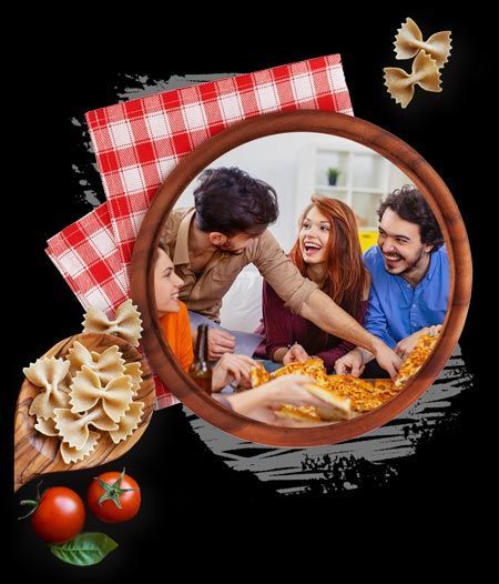 A group of people are sitting around a table eating pizza. A group of people are sitting around a table eating pizza.