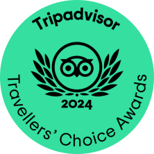 Tripadvisor Travelers’ Choice Awards 2024 badge on a green circle with owl logo and black text