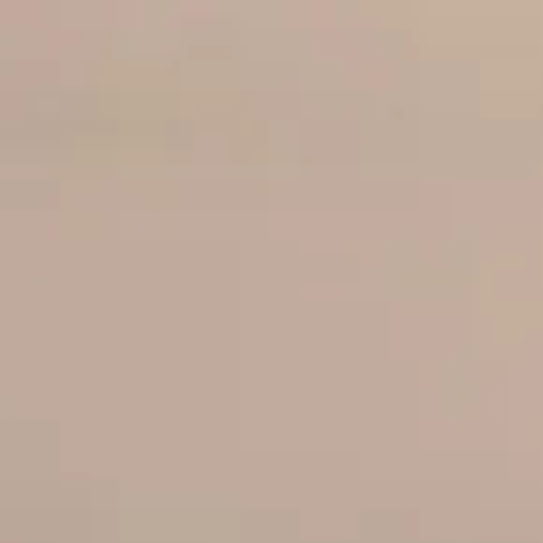 A close up of a beige background with a plain texture.