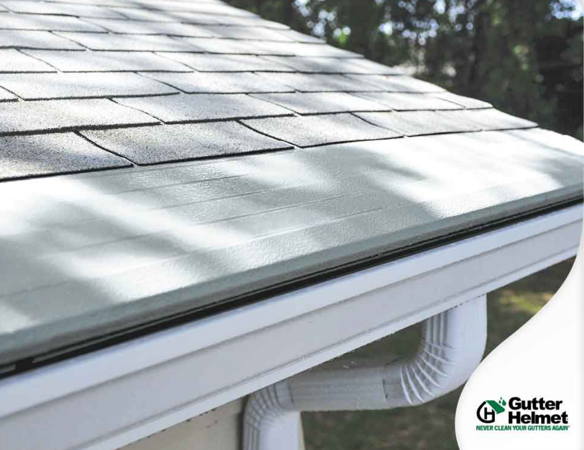 A white gutter with a gutter helmet logo on it