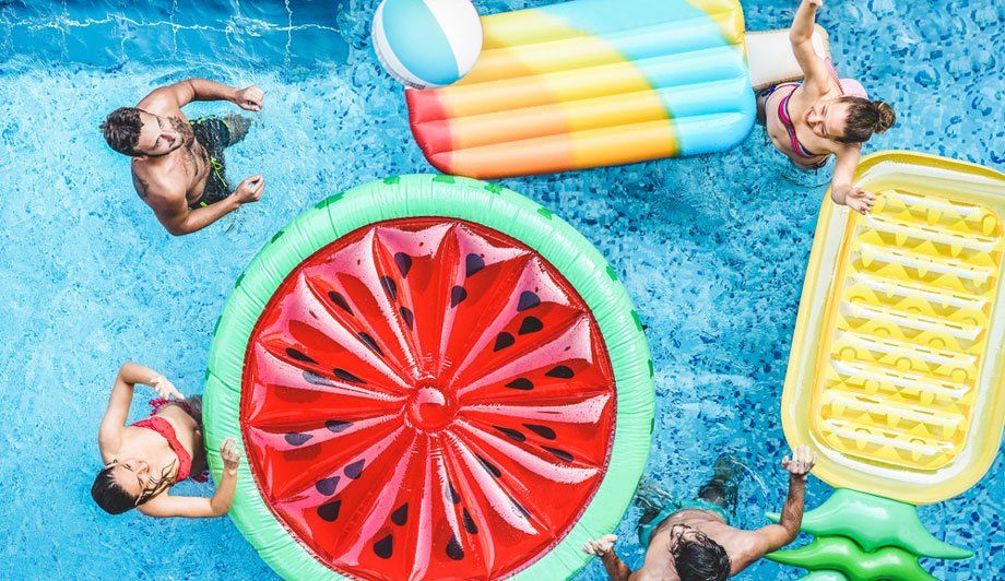 Group Of People Having Fun In Pool — Quality Swimming Pools in Coolangatta, QLD