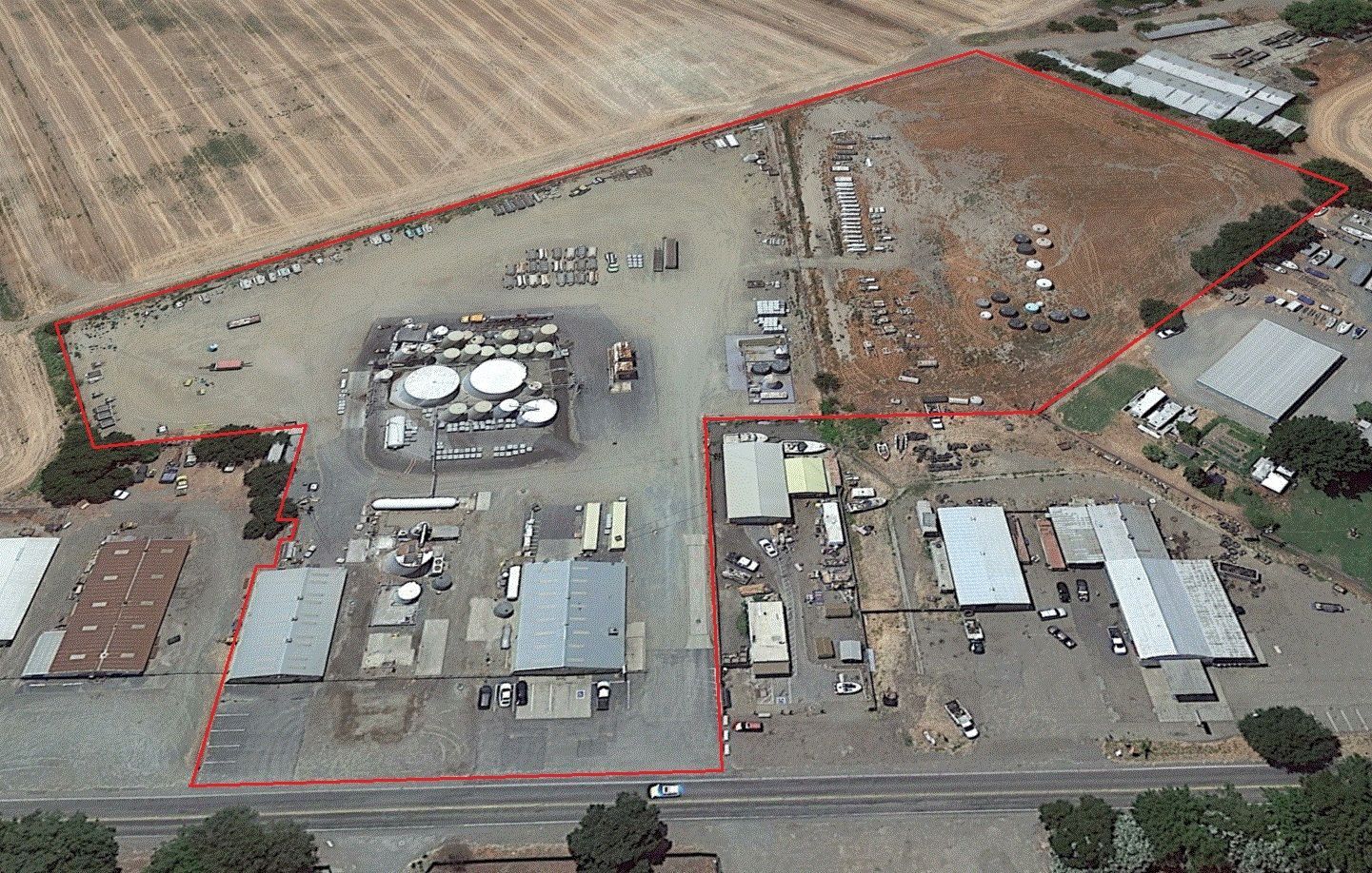 9.66 Acres of M2 land with two free standing metal Industrial buildings of 4800 & 4000 SF.