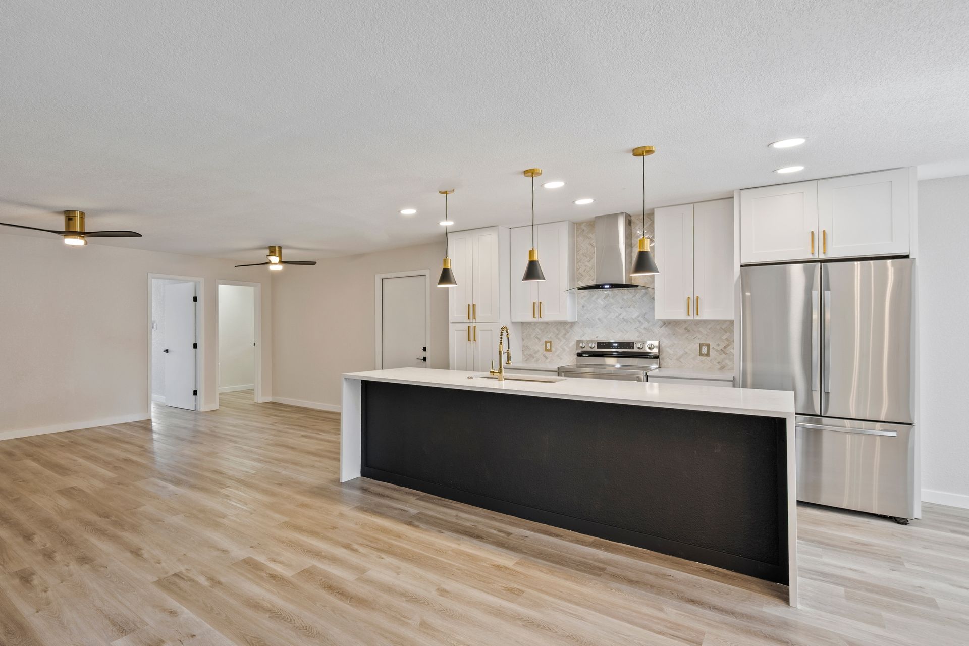 There is a dining room table and chairs in the middle of the room.