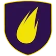 A purple shield with a yellow flame on it.