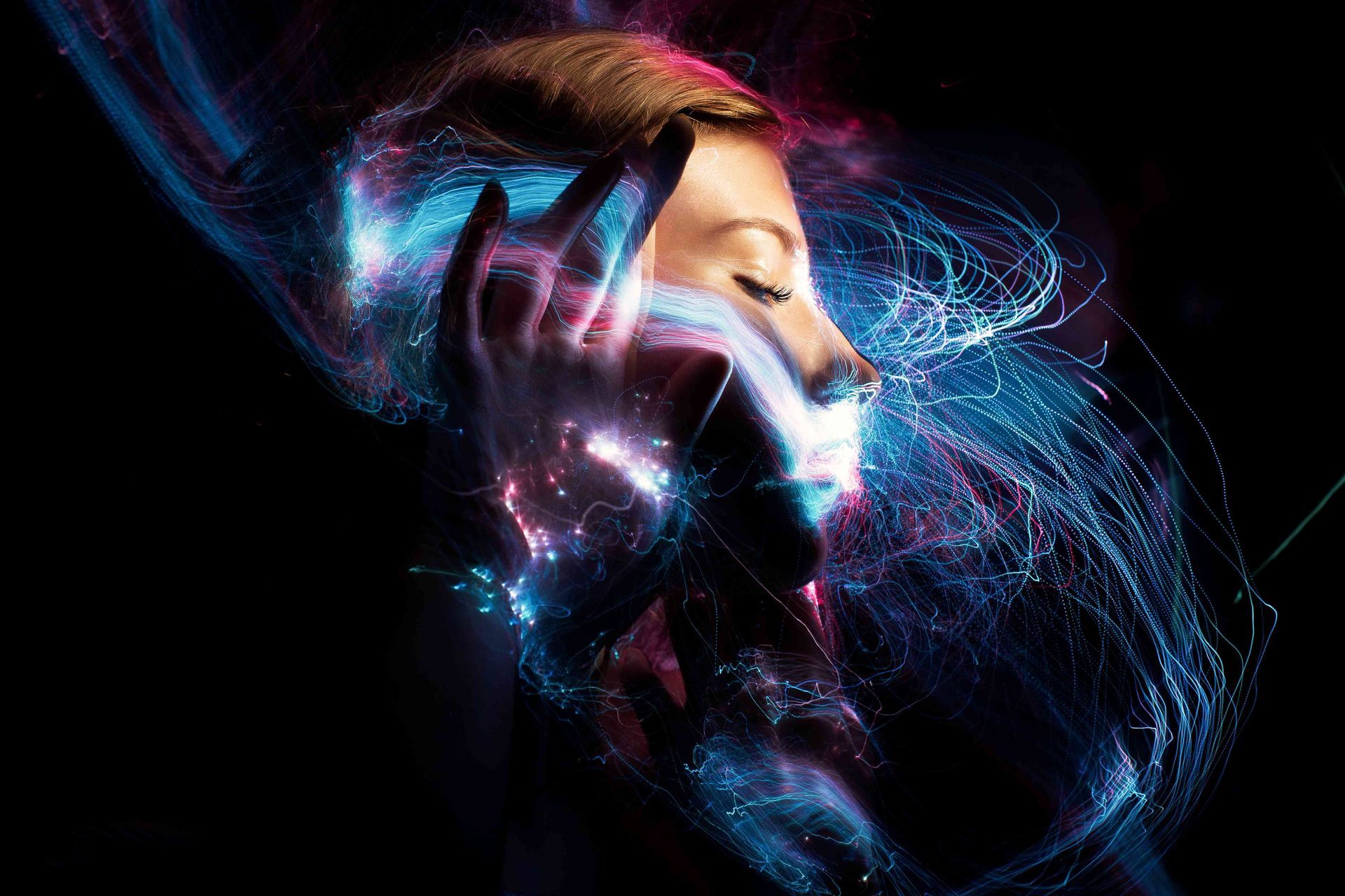 A creative photo of a woman's profile computer enhanced with designs