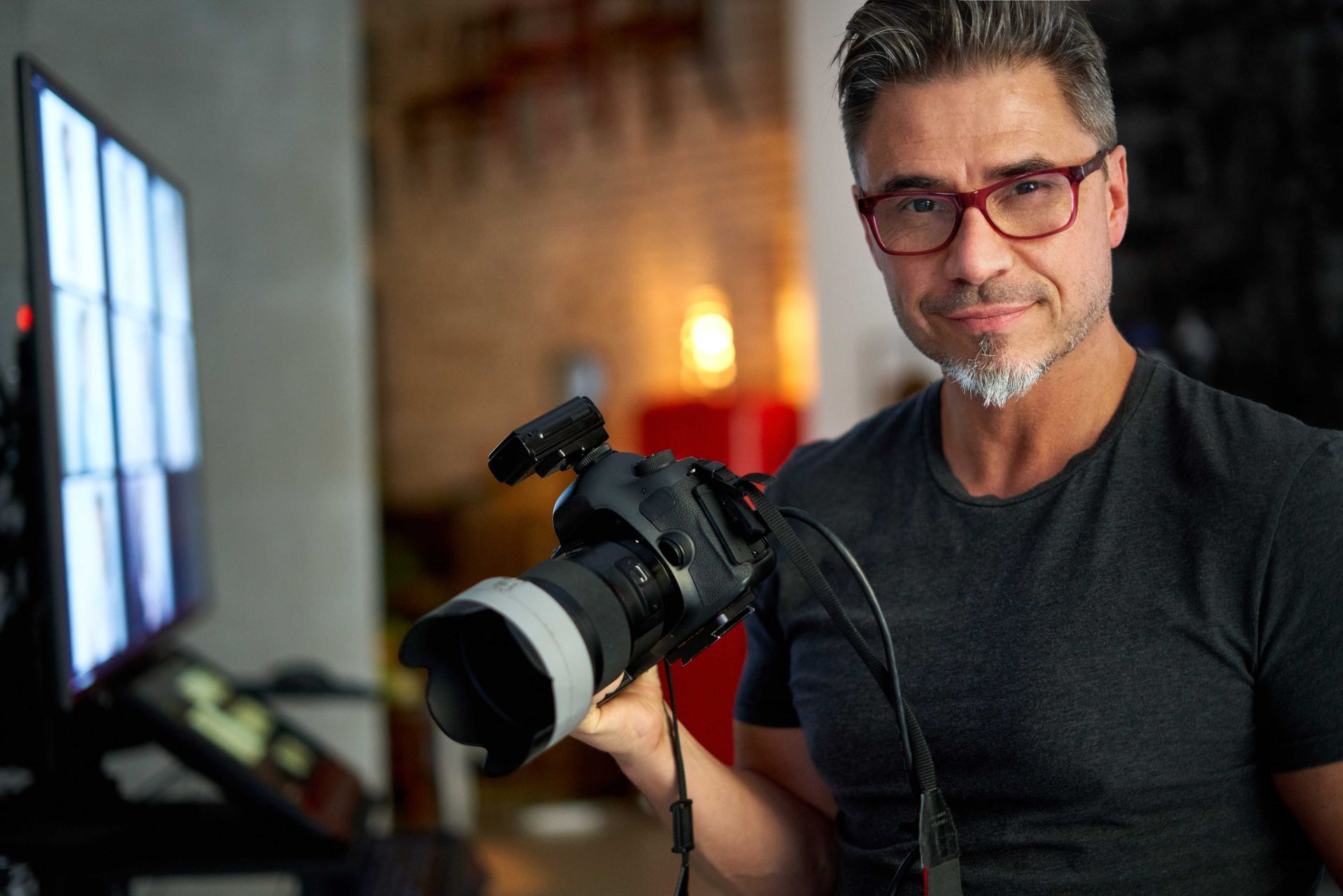 A distinguished male photographer from Amarillo's Photos Photography Company
