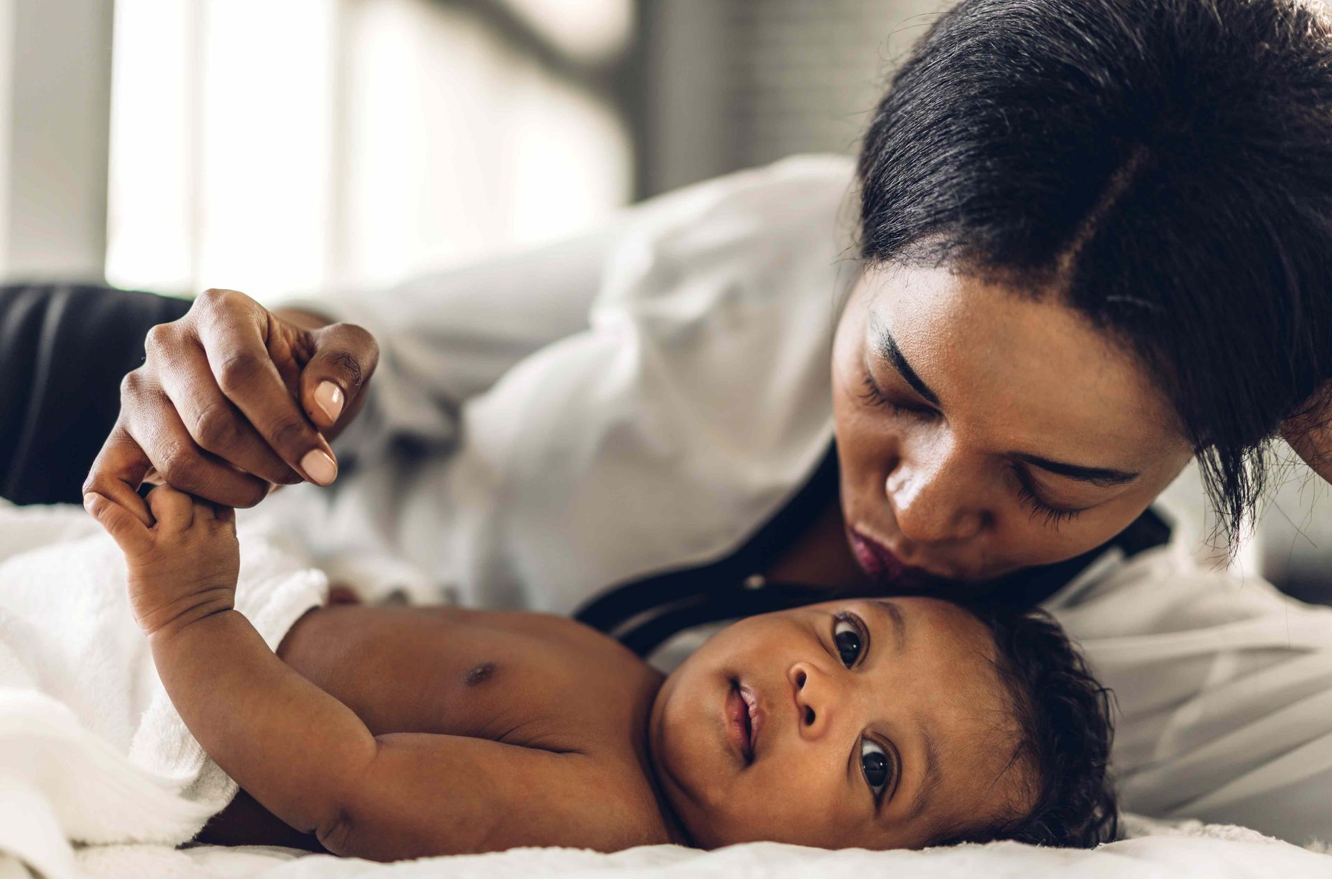 A photo of a mother and her child taken by our photographer