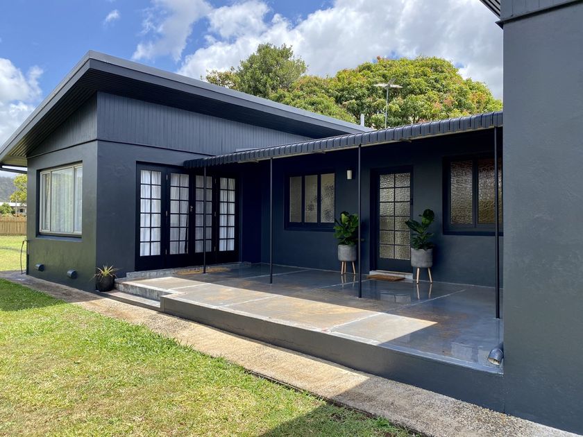Painting the Wall with Red Color — Painters in Tablelands, QLD