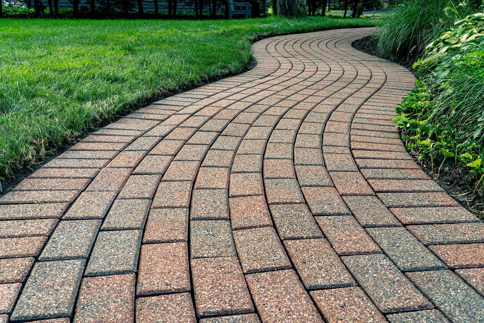 Brick pavers arranged in a curving pattern.