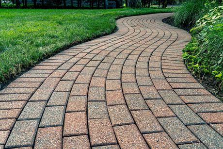 Brick pavers arranged in a curving pattern.