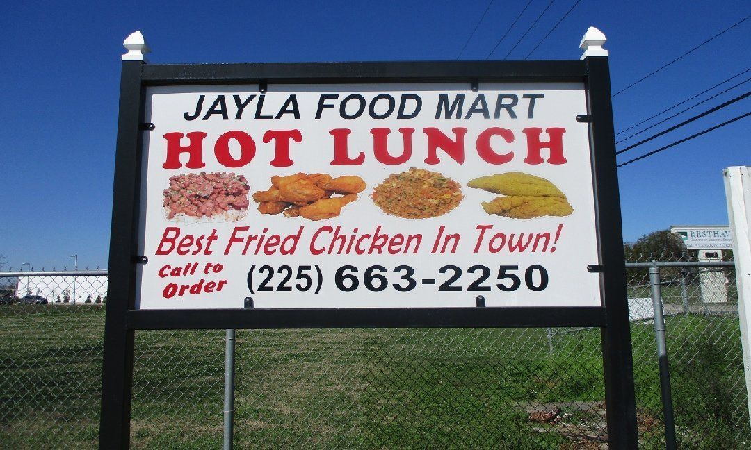 Sign for Jayla Food Mart advertising