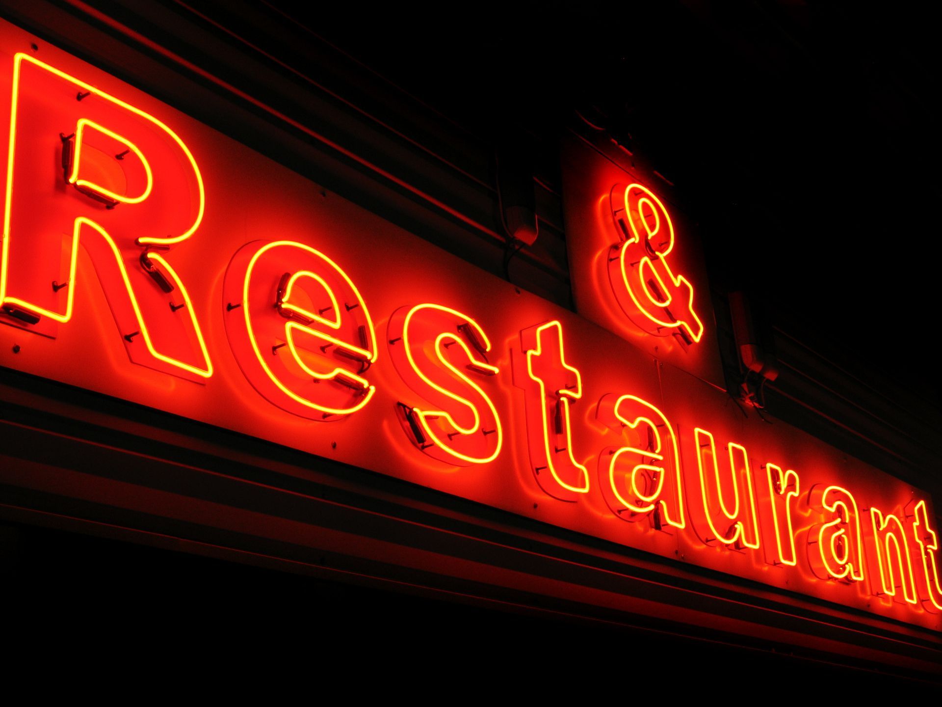 Red neon sign reading 