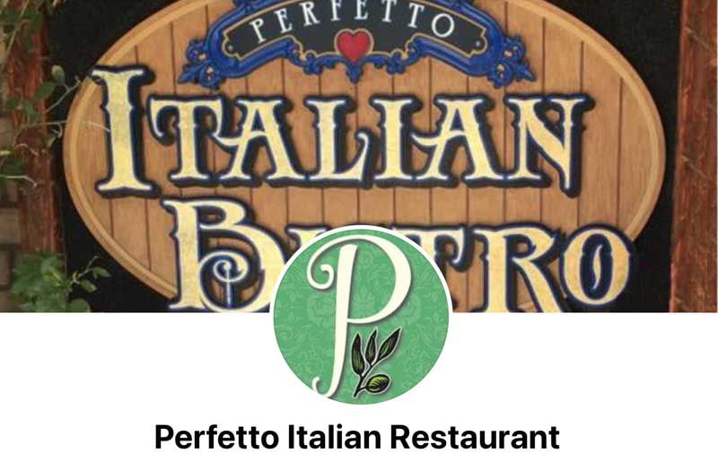 Perfetto Italian Restaurant logo on a wood sign with green emblem