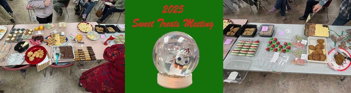Tables of treats at the 2025 Sweet Treats Meeting, featuring a central snow globe with a festive character inside.