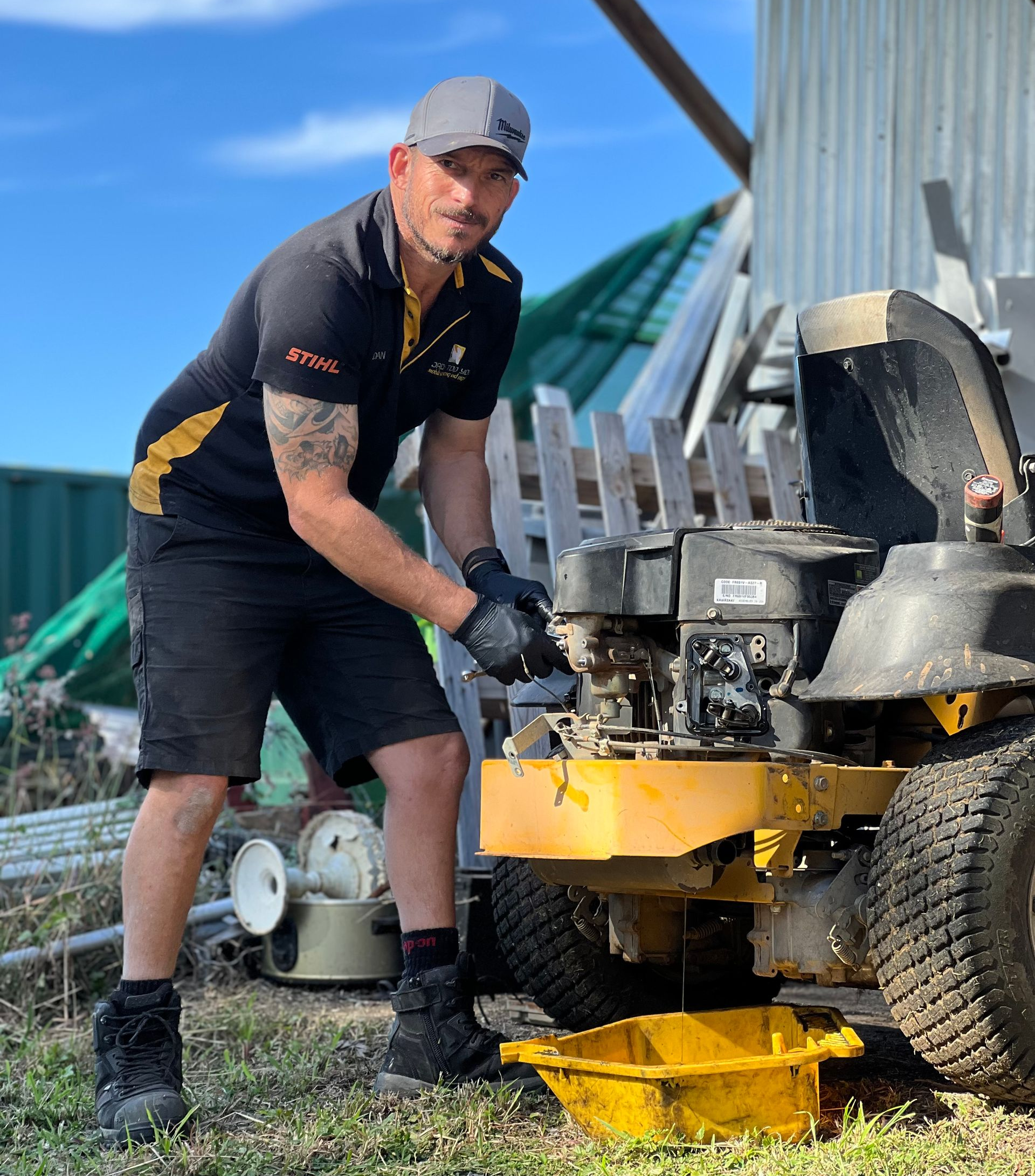 Person Repairing A Yellow Lawnmower — Jack Too You Mobile Servicing and Repairs In Goomboorian, QLD