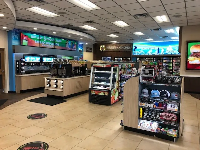 C-Store Equipment: c-store-equipment-with-soda-machines-open-display-coolers-and-merchandise