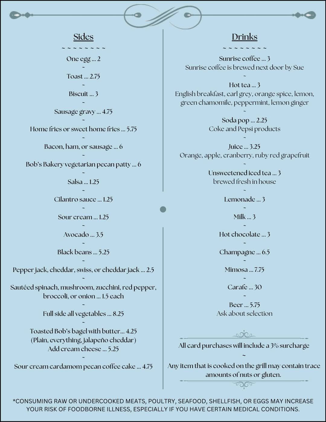 Blue-and-cream cocktail menu with two columns listing cocktails and ingredients, decorated with floral corners