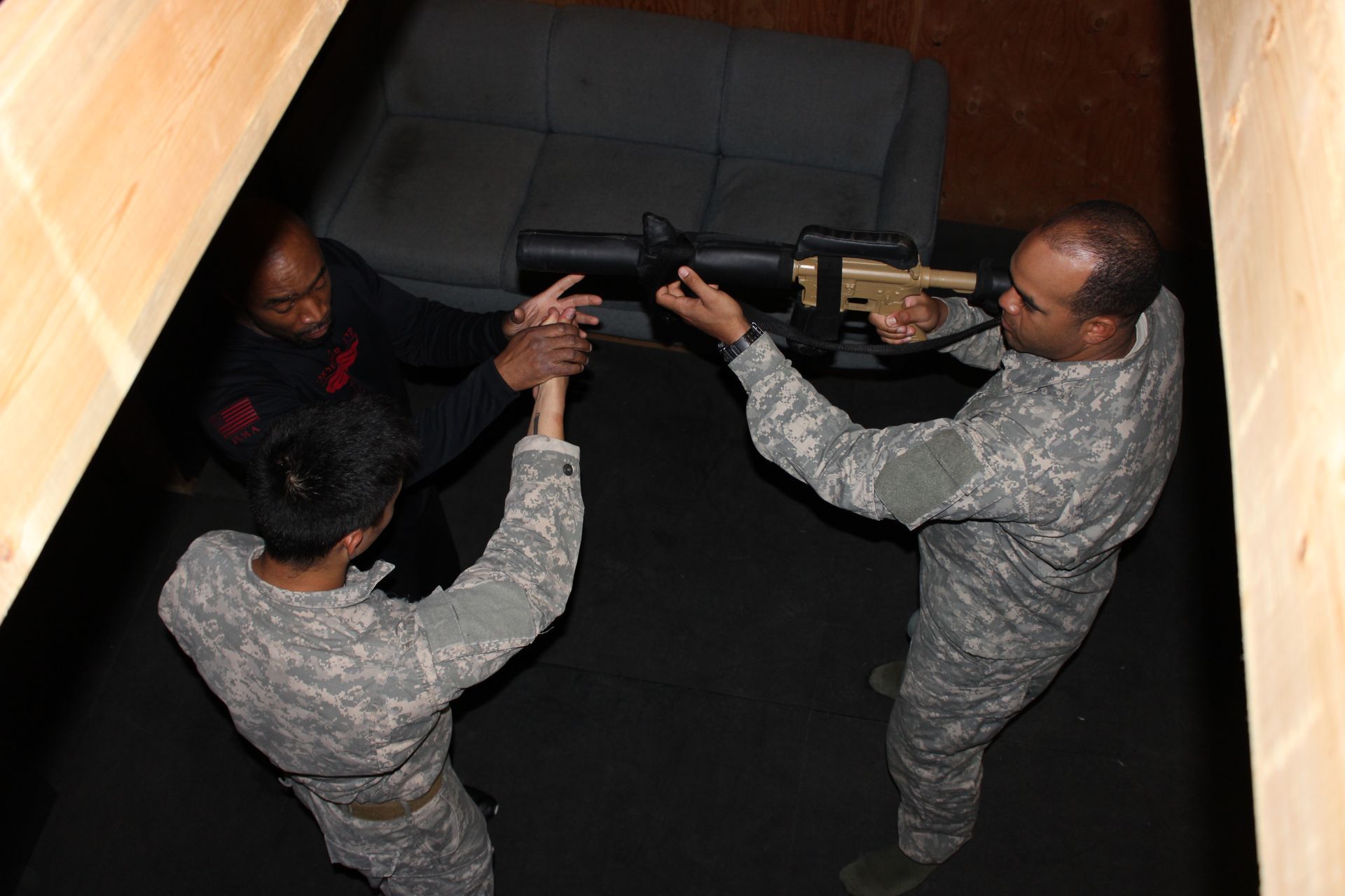 Military men training with rifle