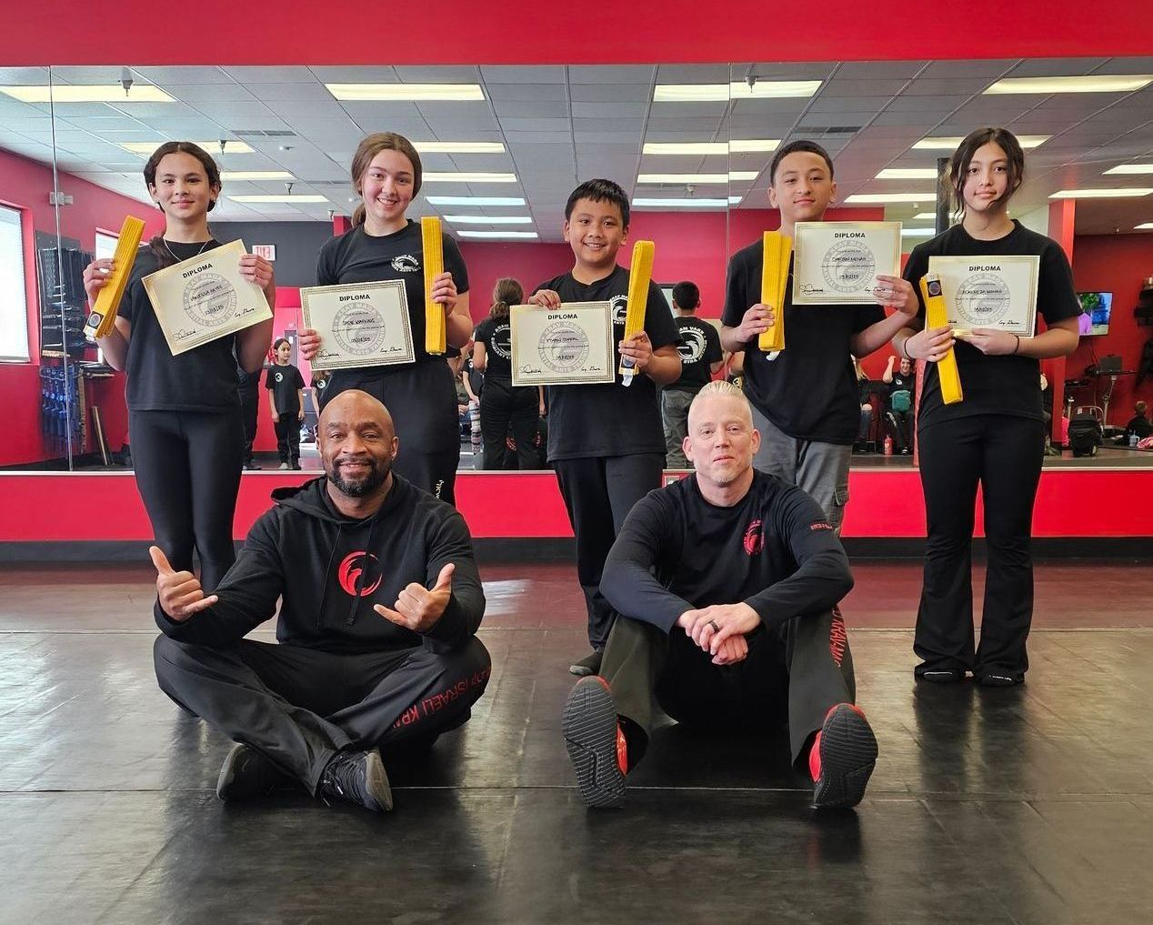 children kneeling for yellow belt